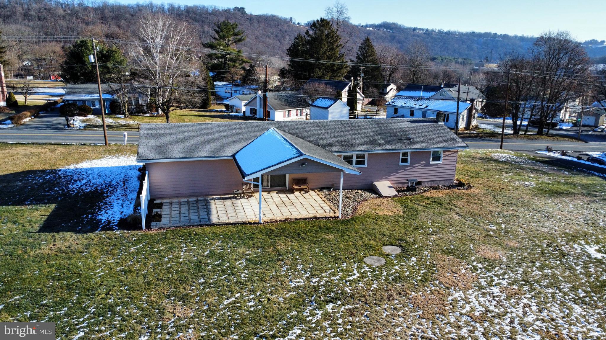 315 Long Lane Road Walnutport, PA 18088 - Photo 22 of 31 a aerial view of a house with swimming pool and a yard