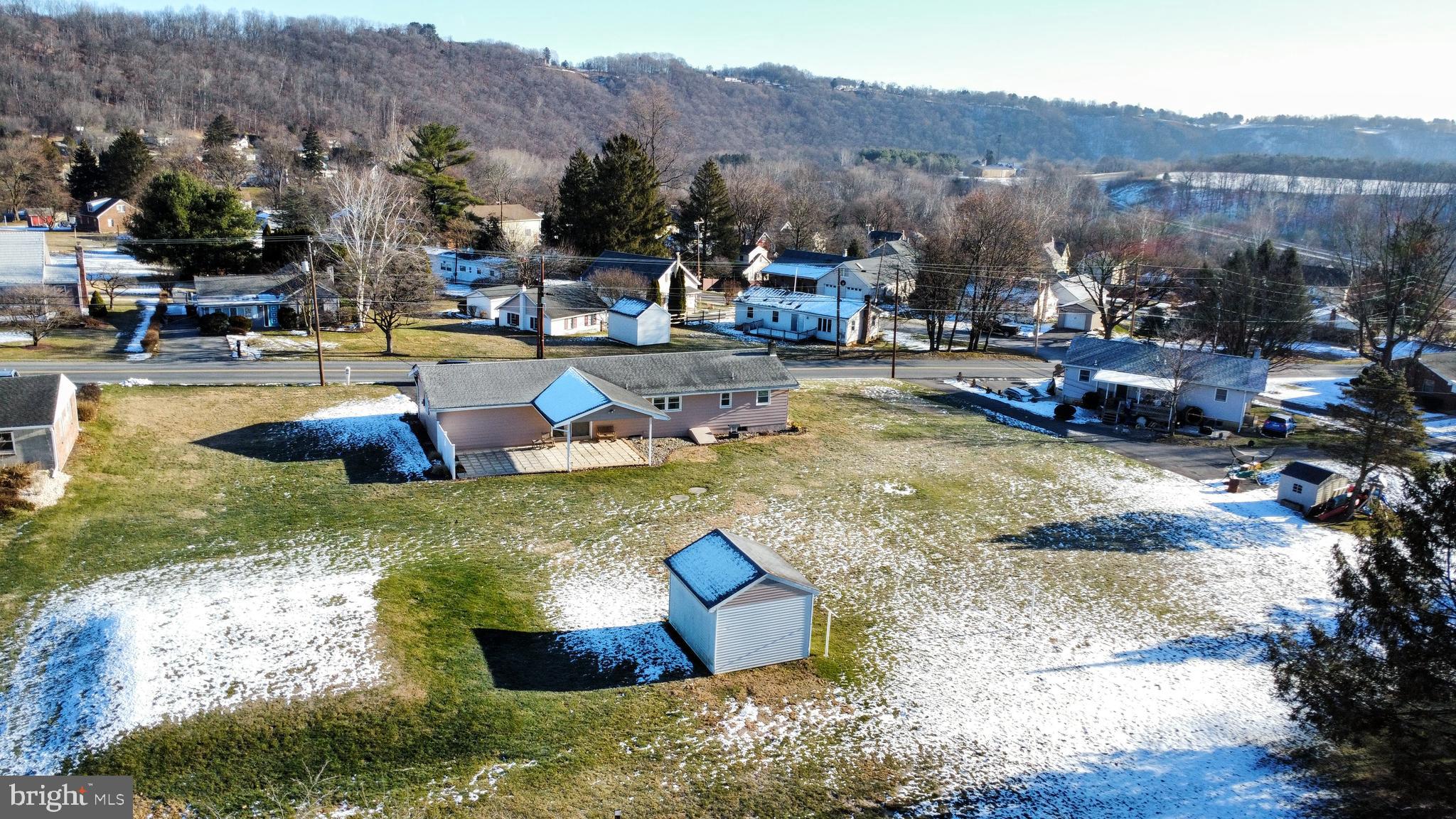 315 Long Lane Road Walnutport, PA 18088 - Photo 23 of 31 a swimming pool with outdoor seating and mountain view