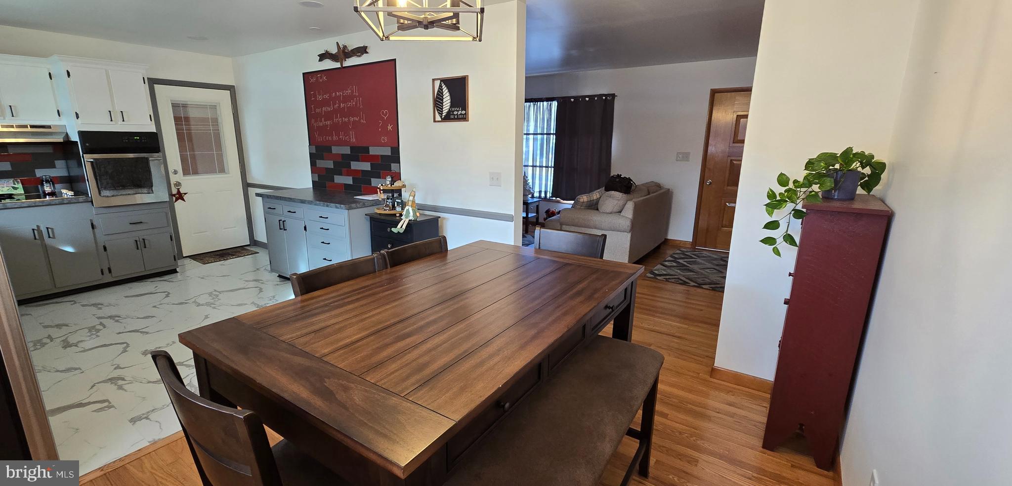 315 Long Lane Road Walnutport, PA 18088 - Photo 8 of 31 a living room with furniture and a flat screen tv