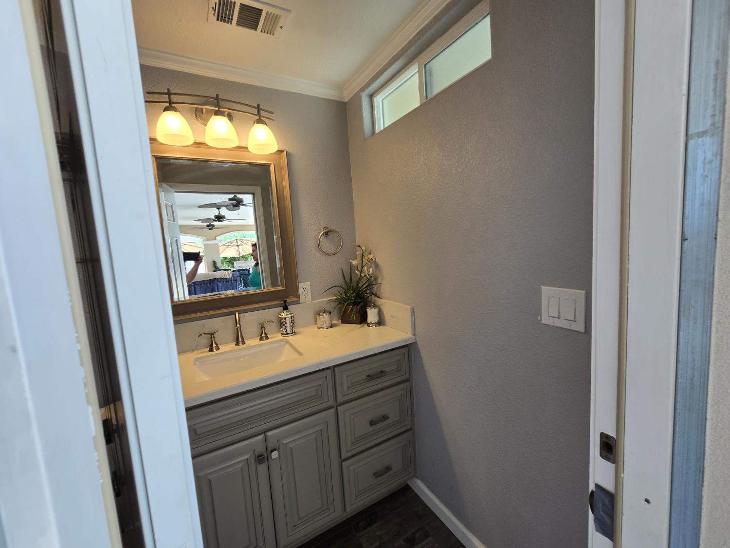 5995 West Brooks Road Merced, CA 95341 - Photo 21 of 23 a bathroom with a sink and a mirror