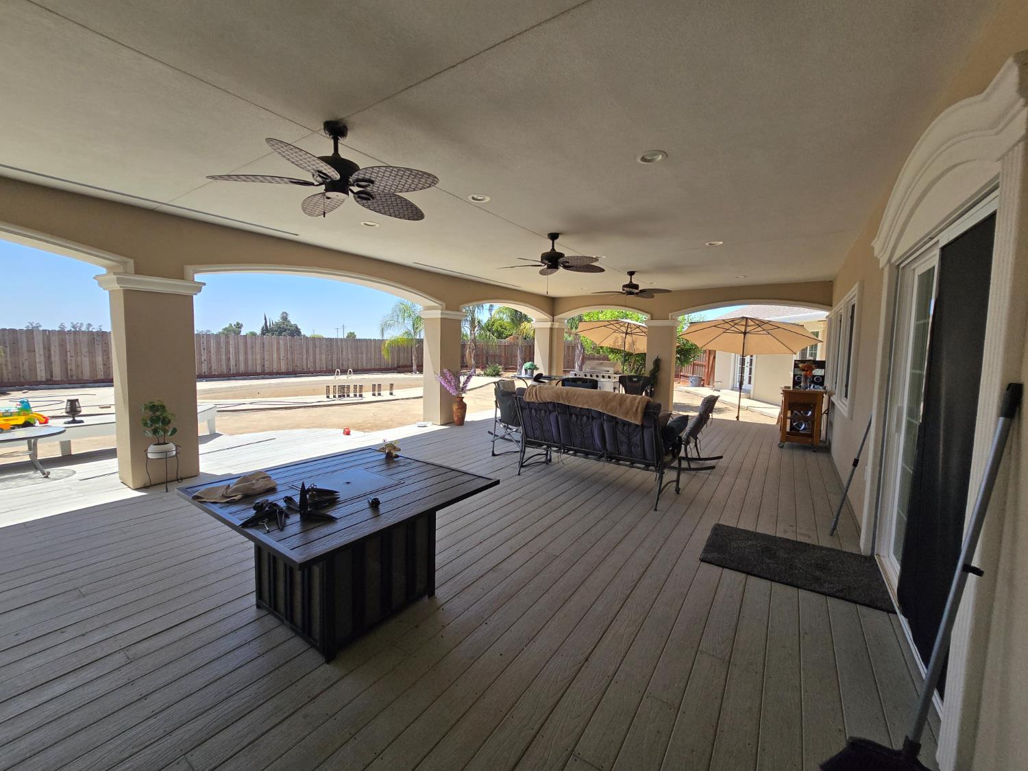 5995 West Brooks Road Merced, CA 95341 - Photo 22 of 23 a living room with furniture and a large window