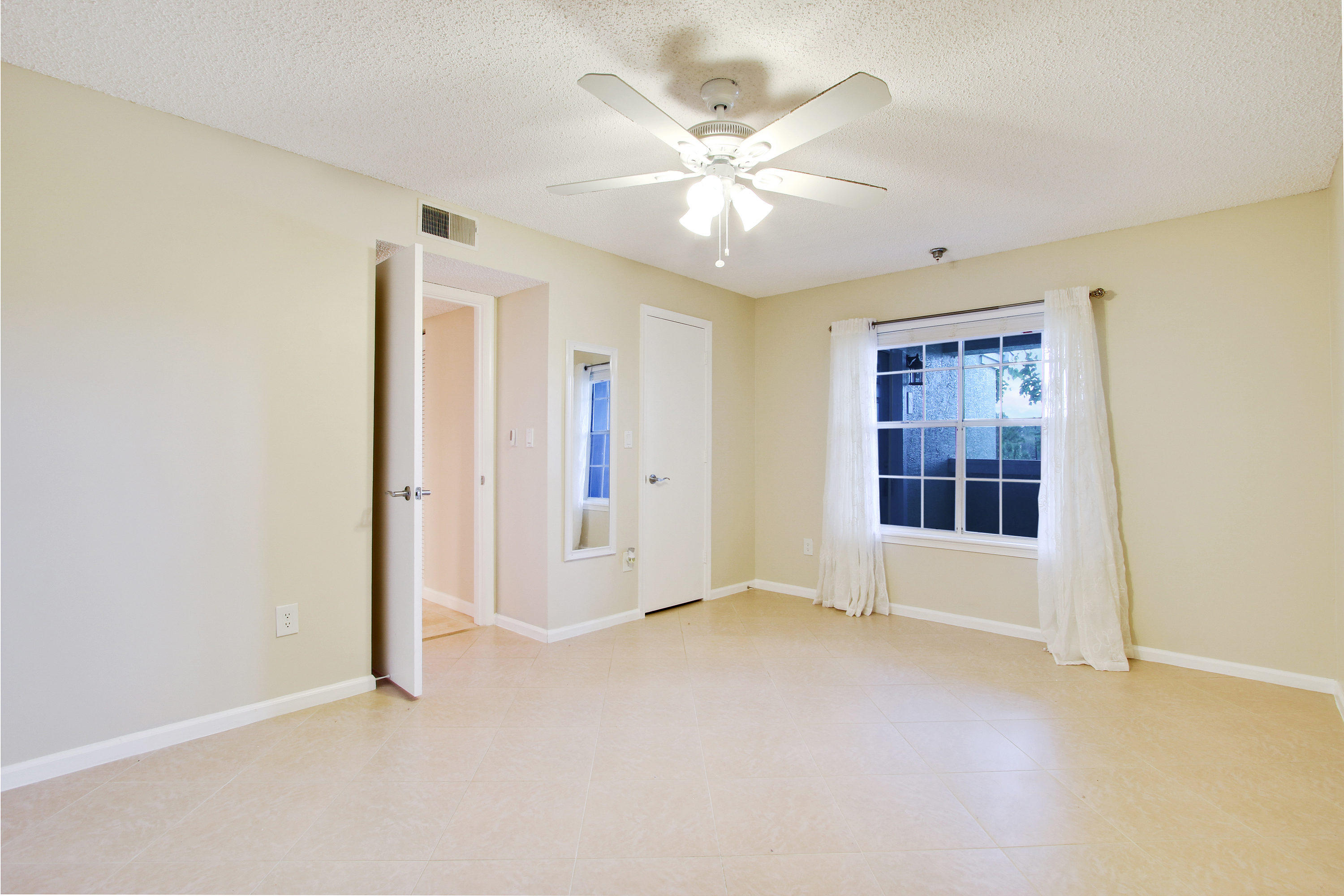 1215 Crystal Way, Unit N Delray Beach, FL 33444 - Photo 11 of 14 Master Bedroom