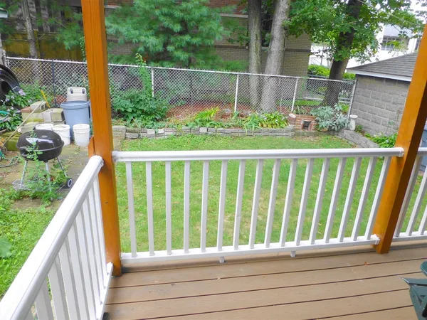 a view of a wooden fence