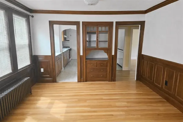 a spacious bathroom with a vanity and mirror