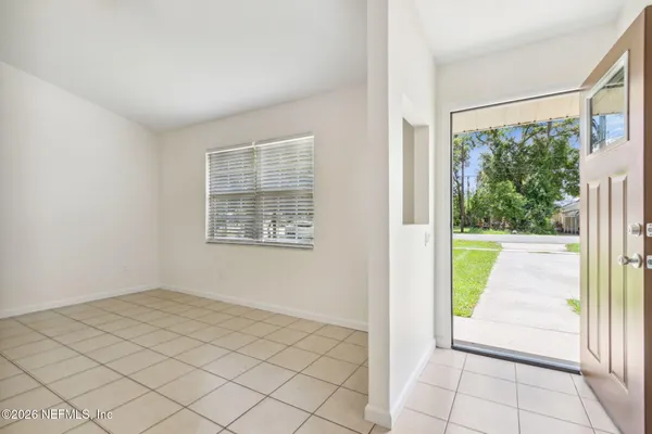 an empty room with windows