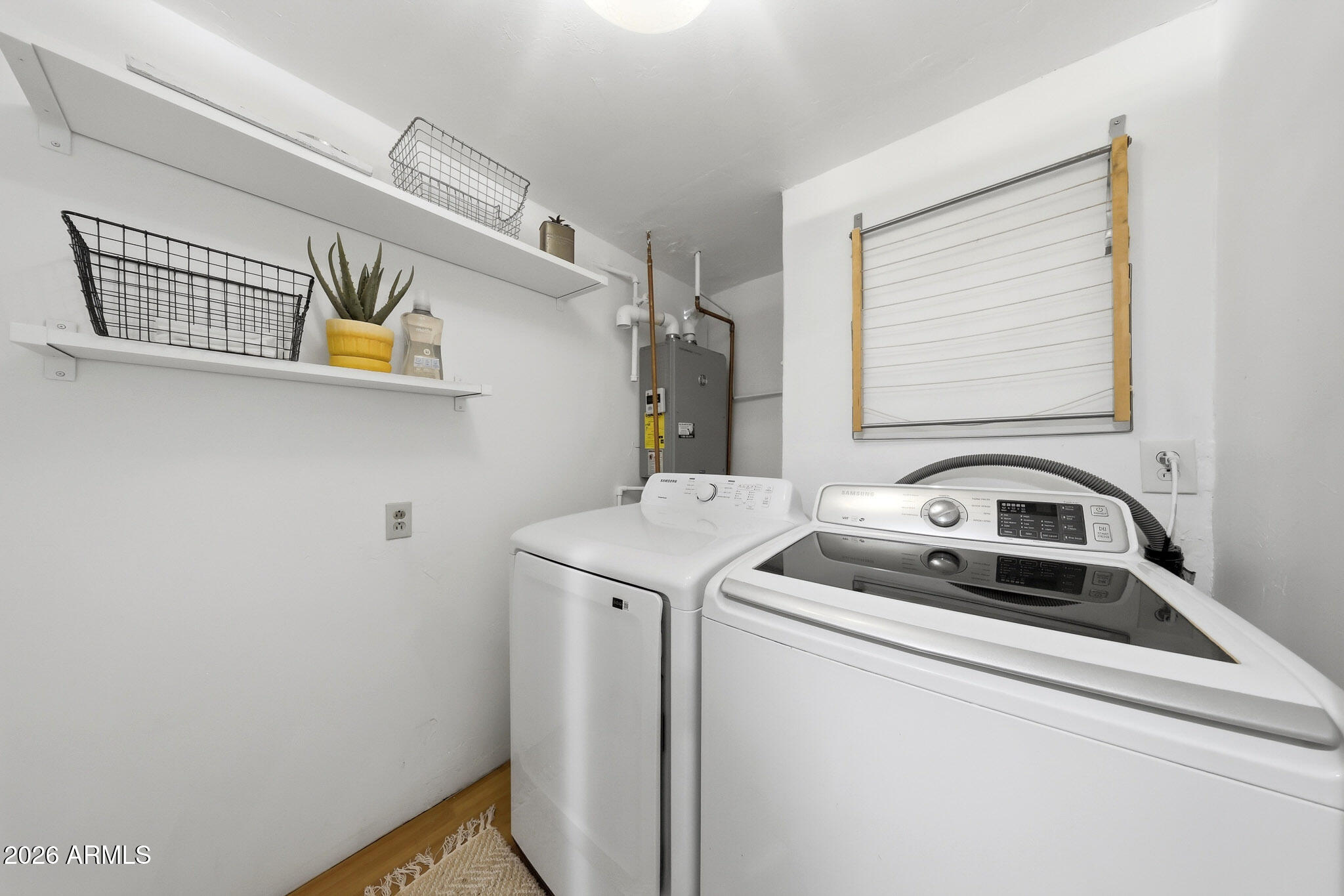 1555 East Cheery Lynn Road Phoenix, AZ 85014 - Photo 27 of 37 a utility room with dryer and washer