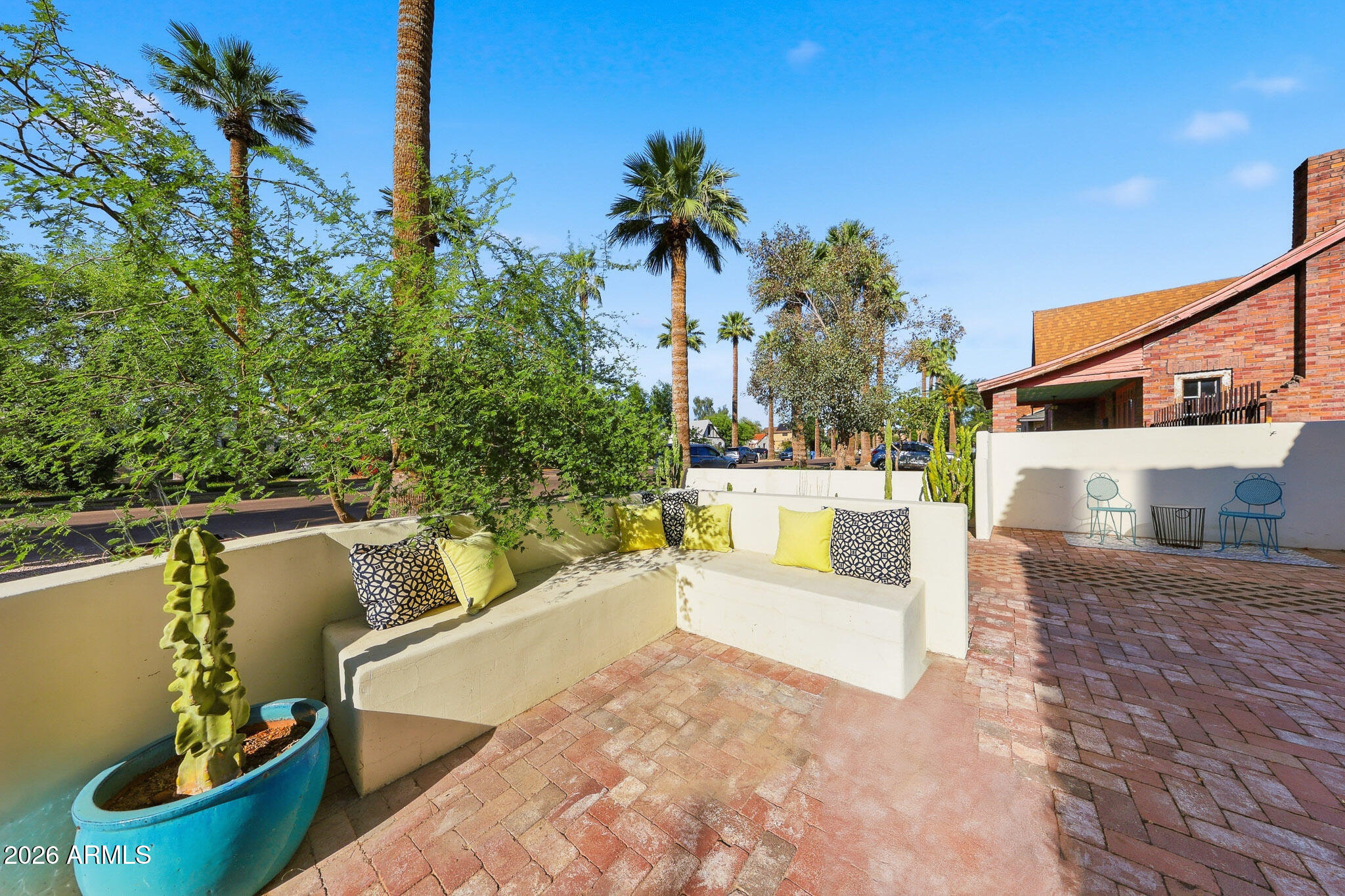 1555 East Cheery Lynn Road Phoenix, AZ 85014 - Photo 5 of 37 a view of a swimming pool with a patio