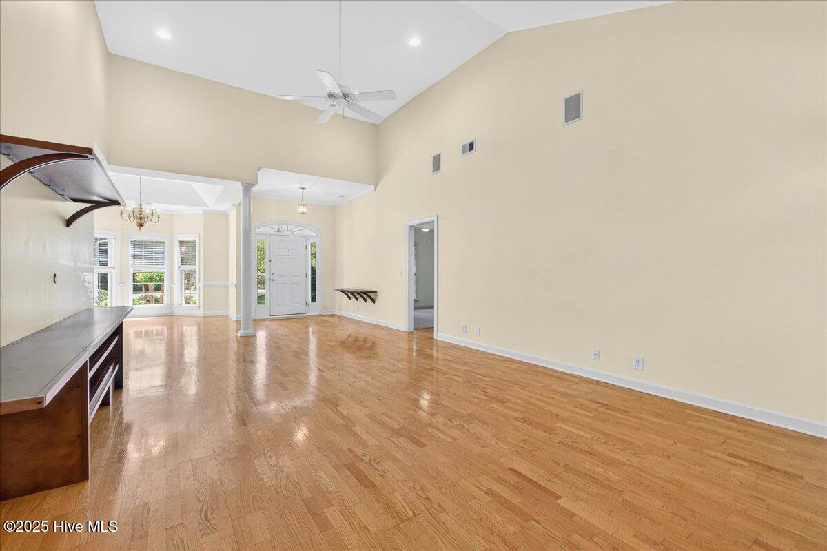 8985 Woodbine Road Southwest Sunset Beach, NC 28468 - Photo 11 of 65 View of the living/dining area standing at the fireplace