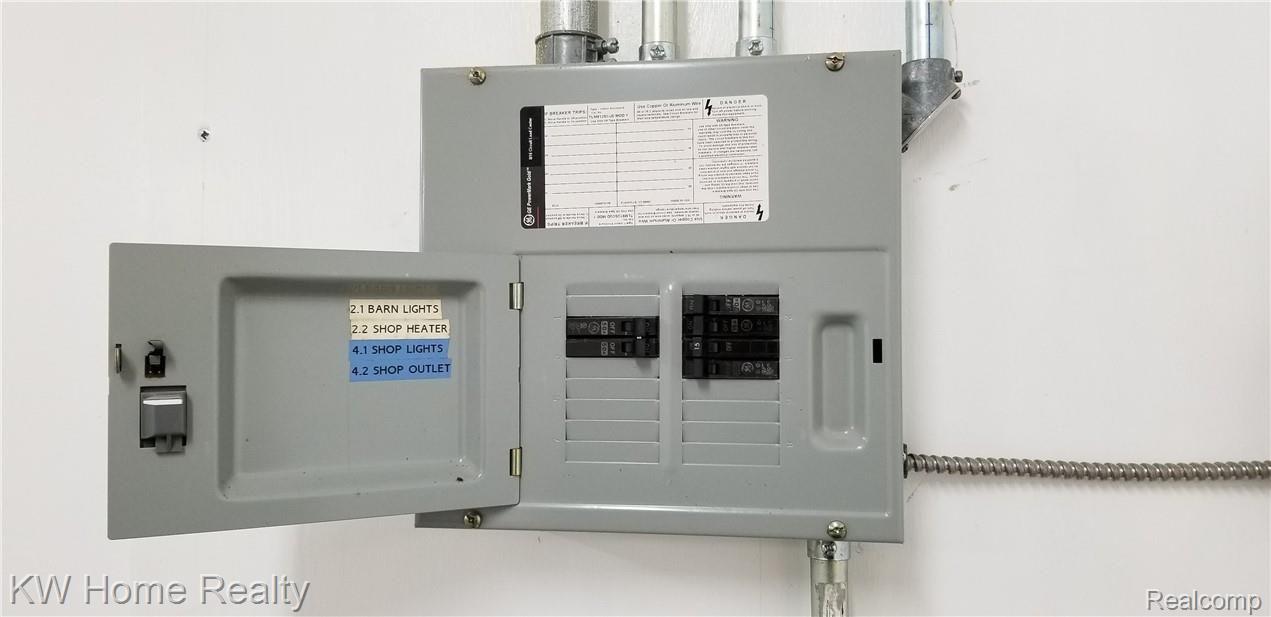 2169 Cove Road Goodells, MI 48027 - Photo 60 of 65 Pole Barn 50 Amp Service Panel