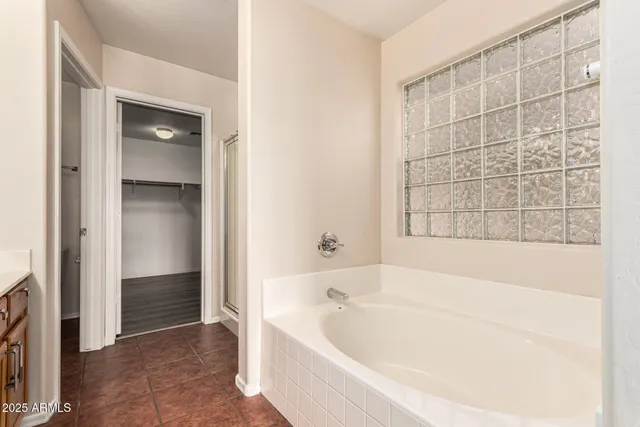 a view of an empty walk in closet