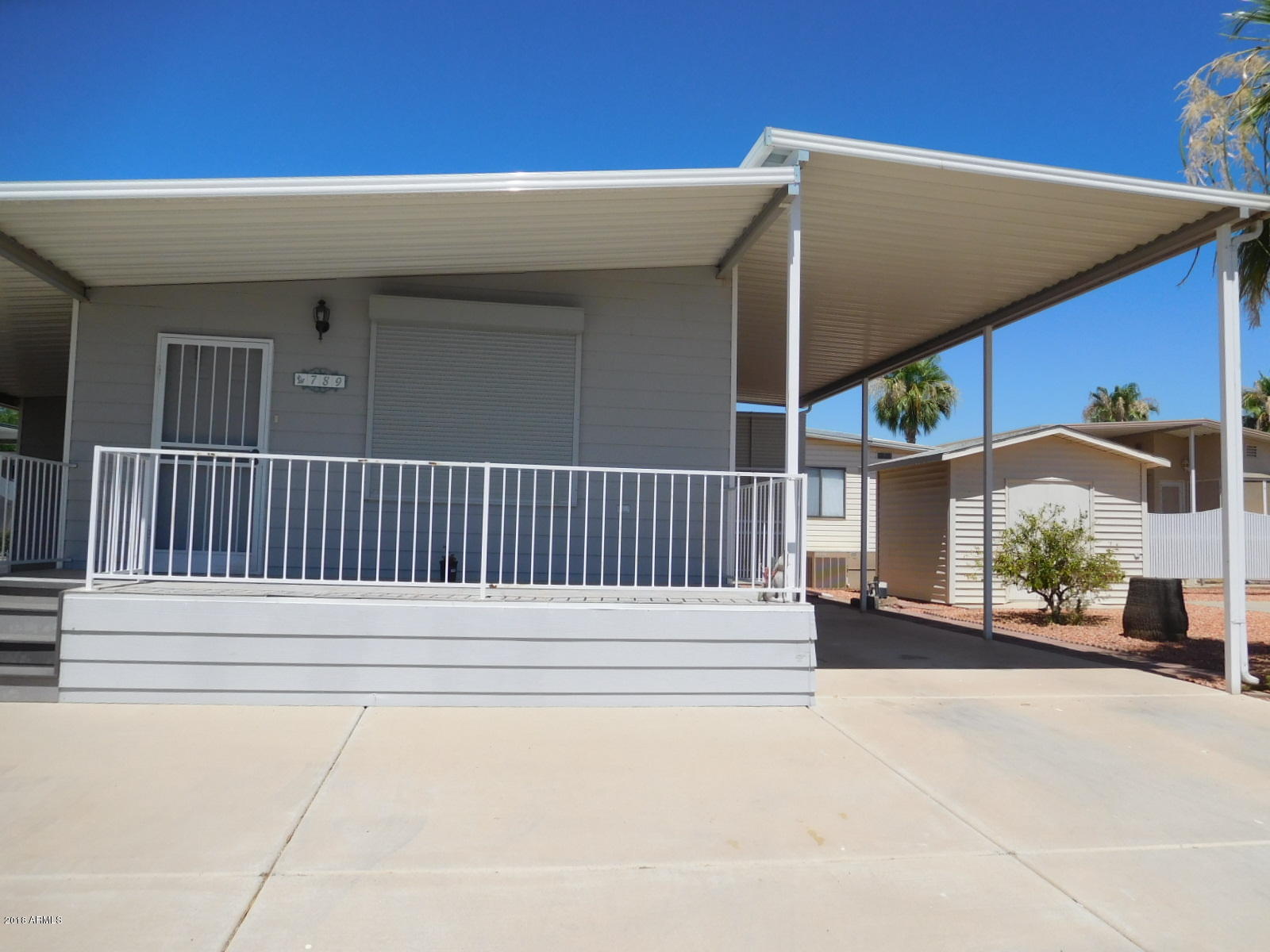 17200 West Bell Road, Unit 789 Surprise, AZ 85374 - Photo 1 of 9 a view of a house with a street