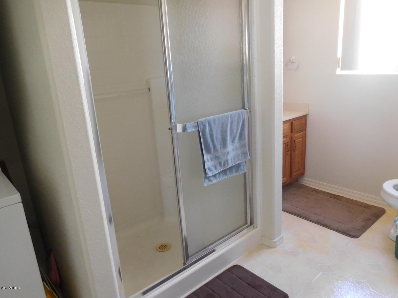 17200 West Bell Road, Unit 789 Surprise, AZ 85374 - Photo 8 of 9 a view of an empty room