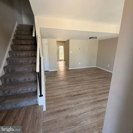 a view of entryway with stairs