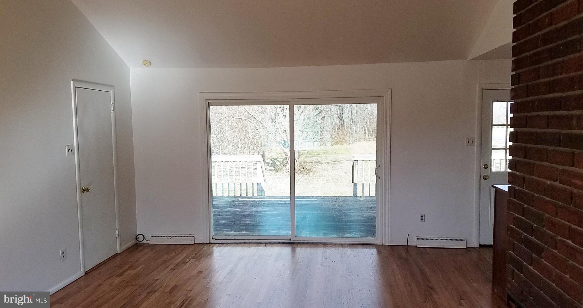 5781 Telegraph Road Elkton, MD 21921 - Photo 9 of 20 Living Room with slider to deck