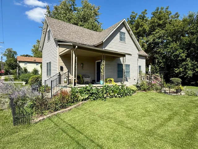 a view of a house with garden