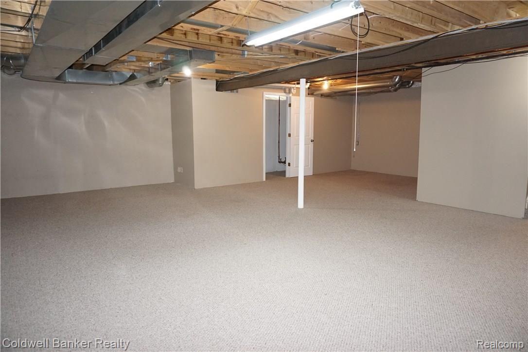 21418 Raintree Drive Macomb, MI 48044 - Photo 15 of 21 Part Finished Lower Level.jpg