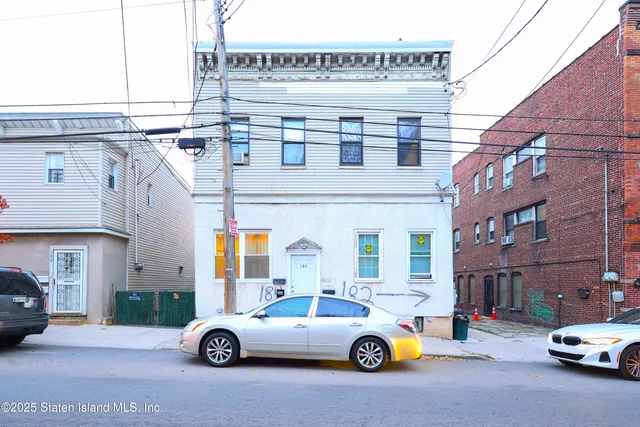 a car parked in front of a building