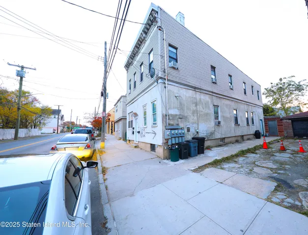 a view of a street with buildings
