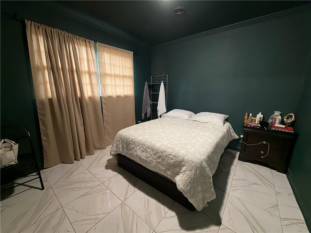 3084 Trafalgar Way Atlanta, GA 30341 - Photo 14 of 31 a bedroom with a bed and a window