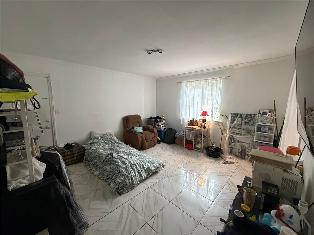 3084 Trafalgar Way Atlanta, GA 30341 - Photo 16 of 31 a bedroom with furniture a air conditioner vent and a window