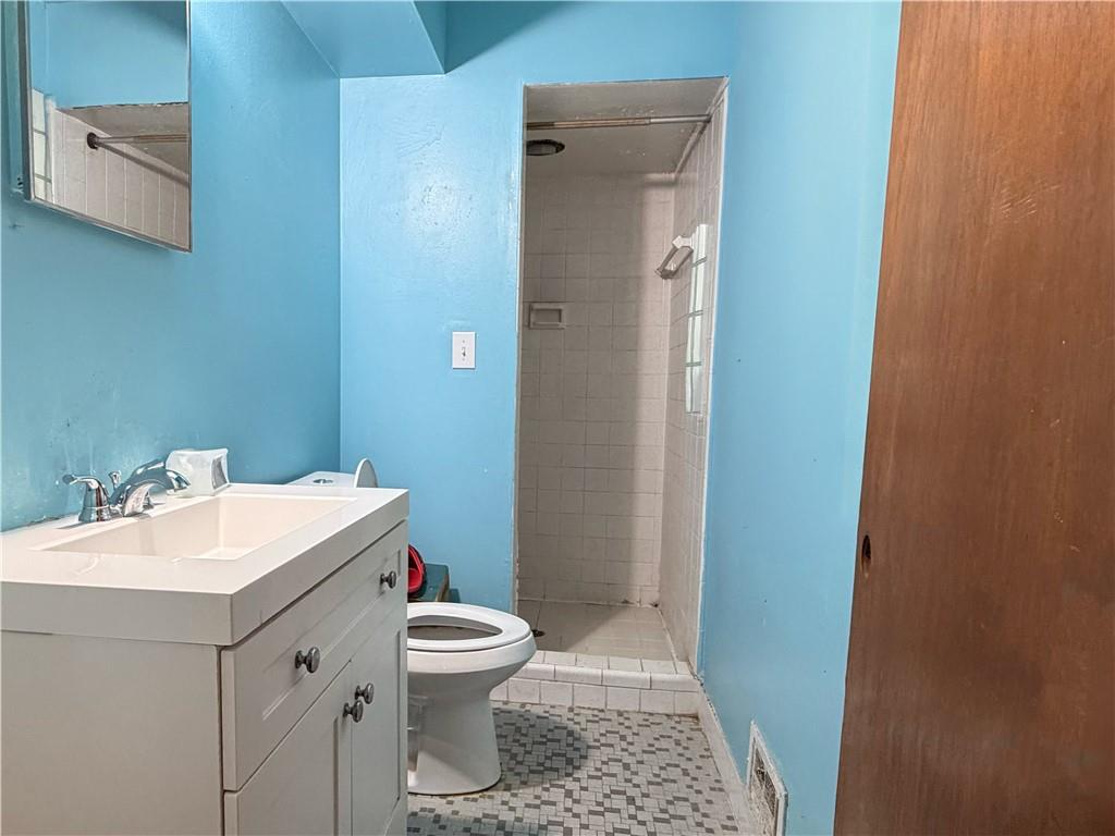 3084 Trafalgar Way Atlanta, GA 30341 - Photo 22 of 31 a bathroom with a sink toilet and vanity