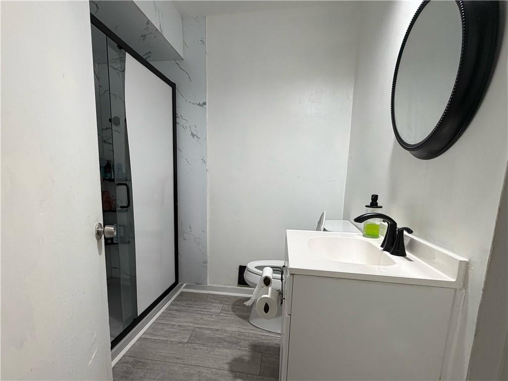3084 Trafalgar Way Atlanta, GA 30341 - Photo 23 of 31 a bathroom with a sink and a mirror