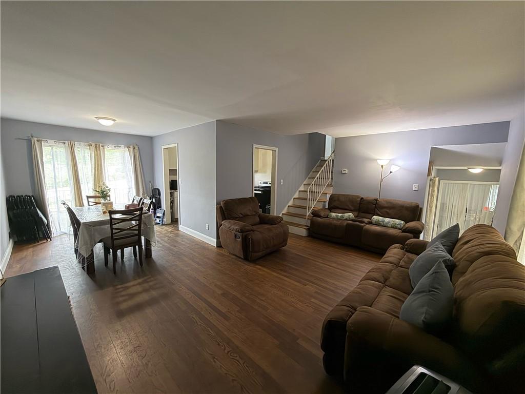 3084 Trafalgar Way Atlanta, GA 30341 - Photo 5 of 31 a living room with furniture and a wooden floor