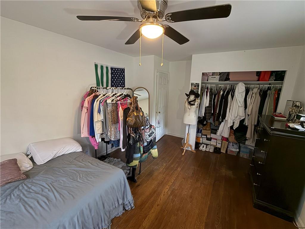 3084 Trafalgar Way Atlanta, GA 30341 - Photo 10 of 31 a bedroom with bed and a chandelier
