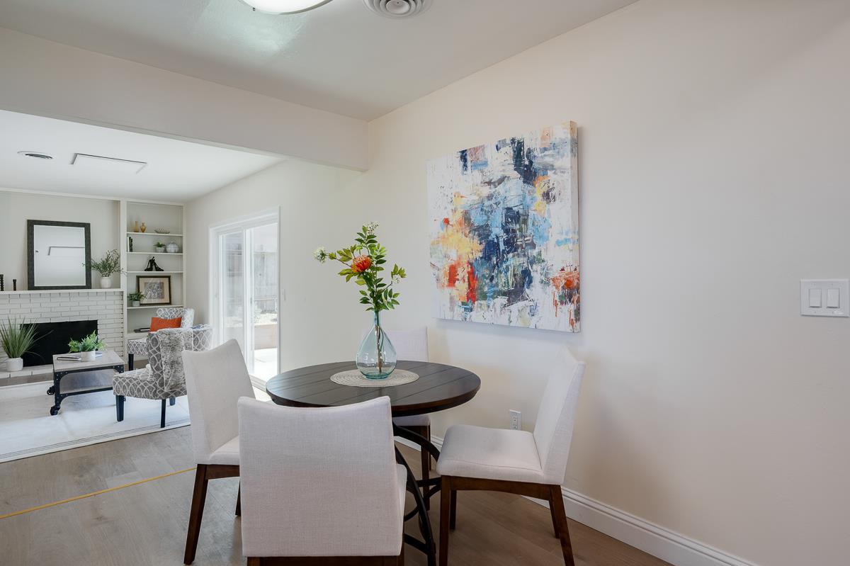 490 Jean Circle Marina, CA 93933 - Photo 19 of 60 a view of a dining room with furniture and wooden floor