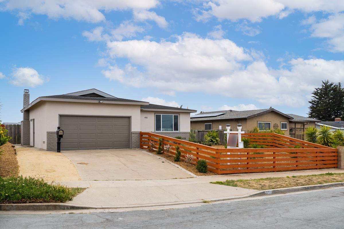 490 Jean Circle Marina, CA 93933 - Photo 2 of 60 a front view of a house with yard
