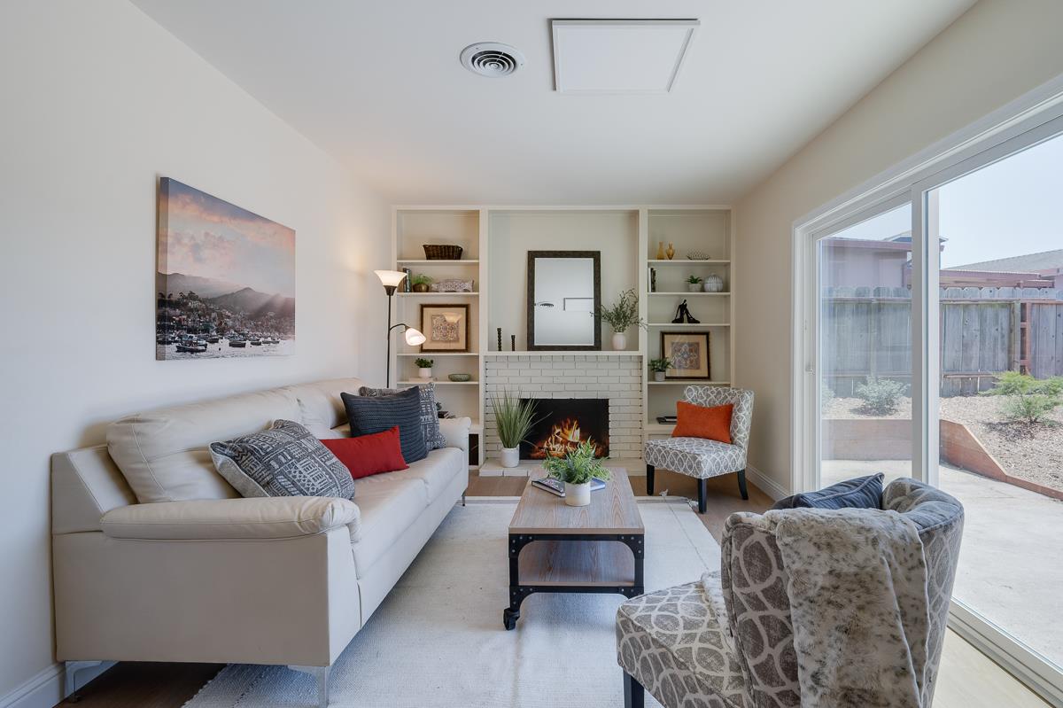 490 Jean Circle Marina, CA 93933 - Photo 24 of 60 a living room with furniture and a fireplace