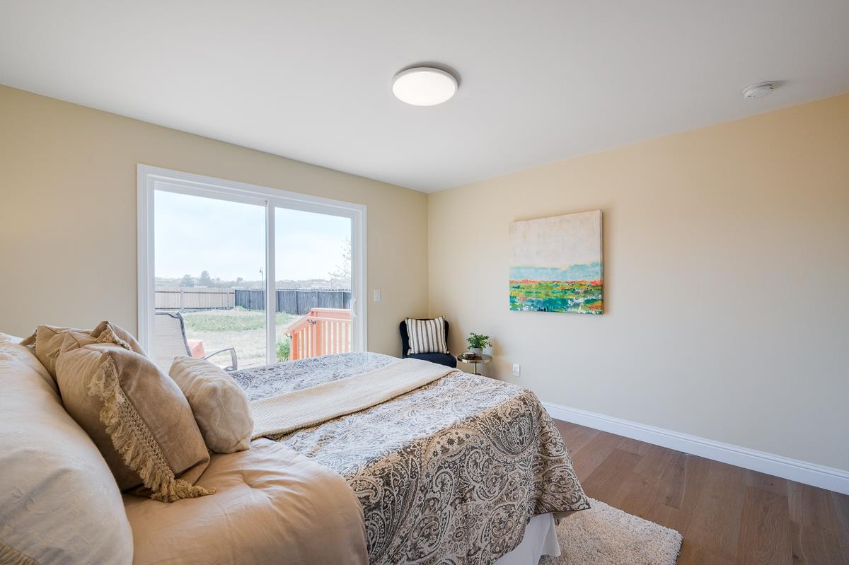 490 Jean Circle Marina, CA 93933 - Photo 27 of 60 a bedroom with a bed and a window
