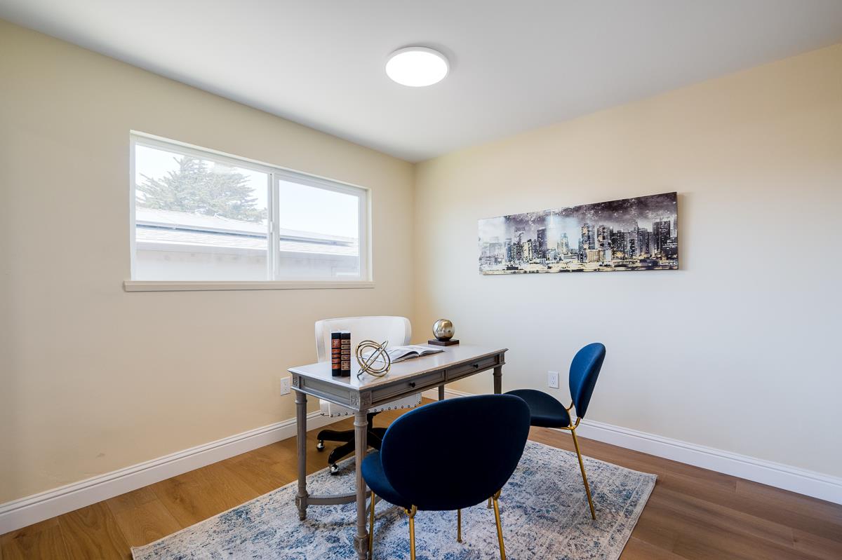 490 Jean Circle Marina, CA 93933 - Photo 32 of 60 a view of a workspace with furniture and a window
