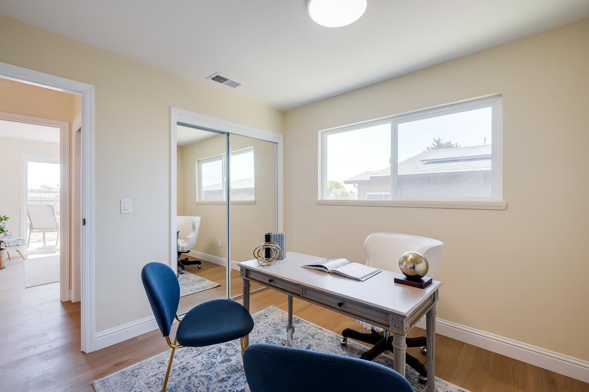 490 Jean Circle Marina, CA 93933 - Photo 34 of 60 a view of a workspace with furniture and a window