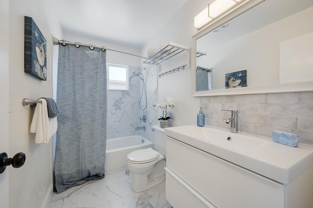 490 Jean Circle Marina, CA 93933 - Photo 40 of 60 a bathroom with a sink a toilet and shower