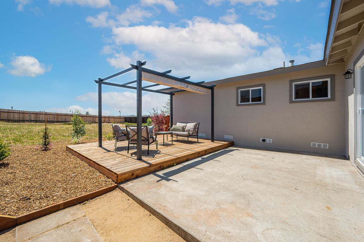 490 Jean Circle Marina, CA 93933 - Photo 43 of 60 a view of a terrace with wooden floor and a ocean view