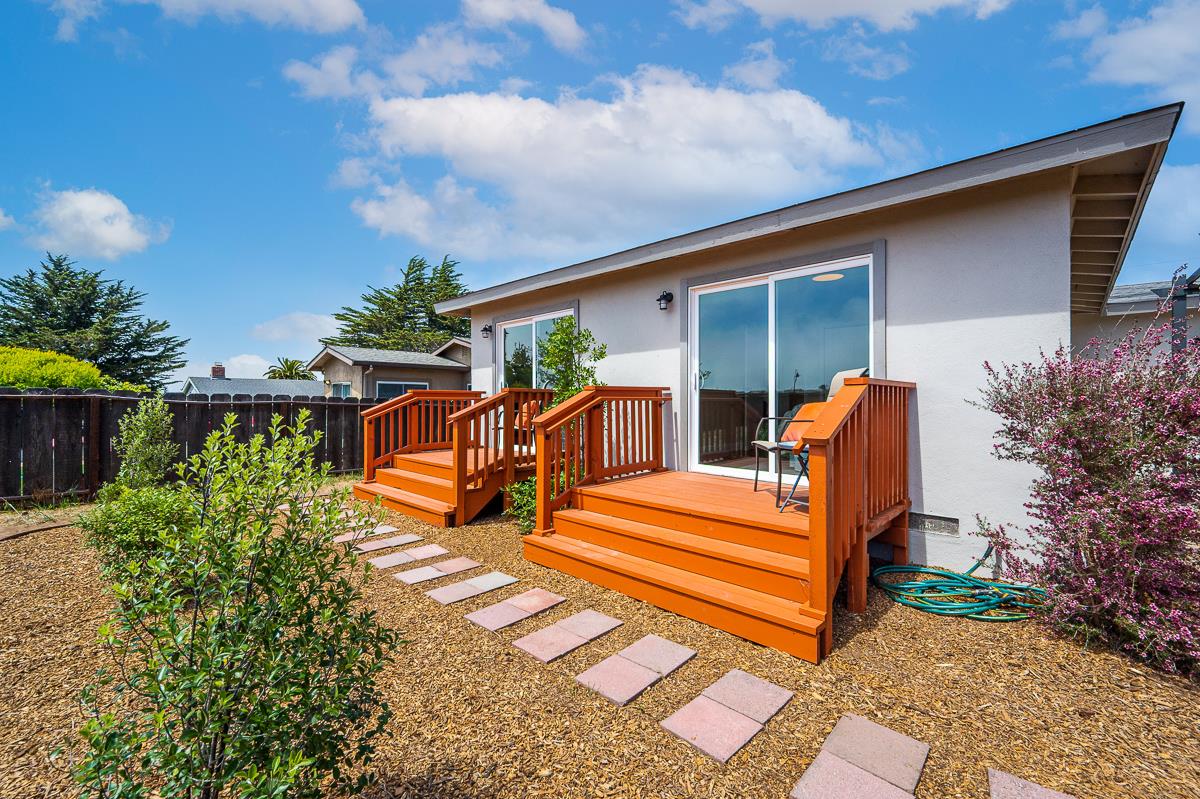 490 Jean Circle Marina, CA 93933 - Photo 47 of 60 a backyard of a house with barbeque oven table and chairs
