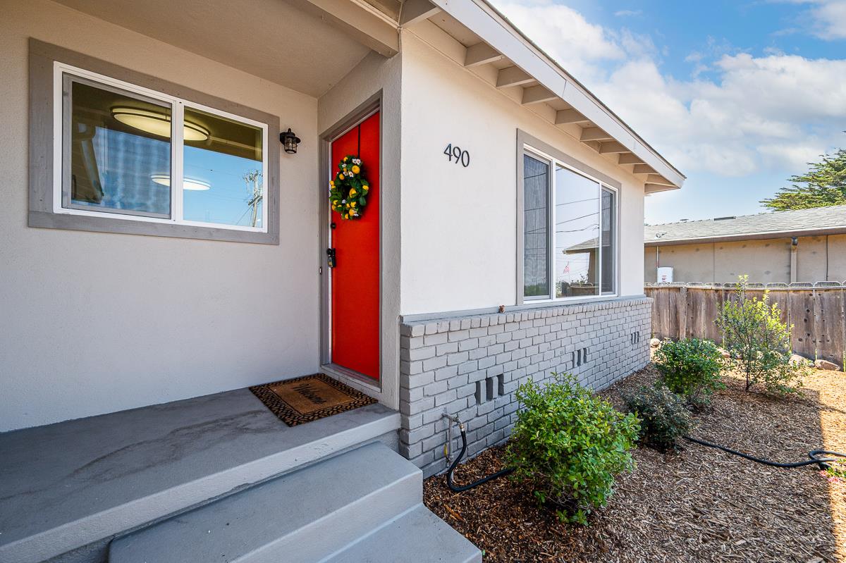 490 Jean Circle Marina, CA 93933 - Photo 54 of 60 a front view of a house with a garage