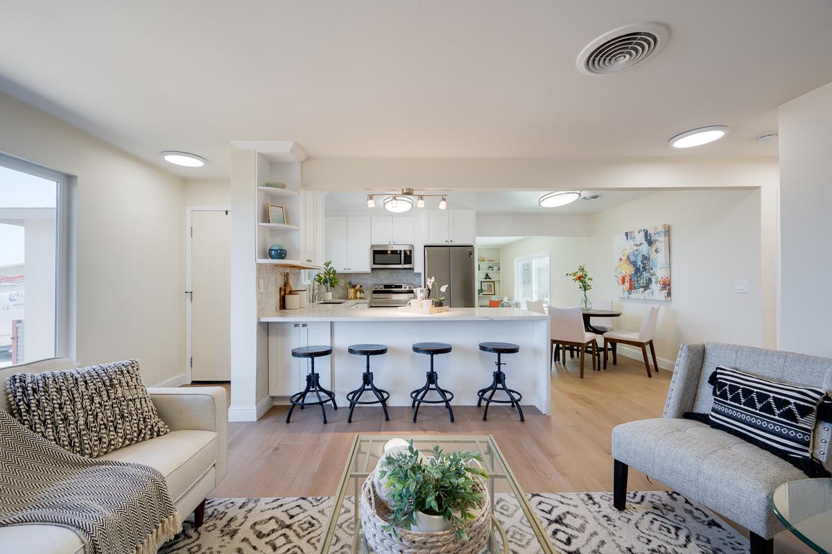 490 Jean Circle Marina, CA 93933 - Photo 10 of 60 a living room with furniture kitchen view and a window