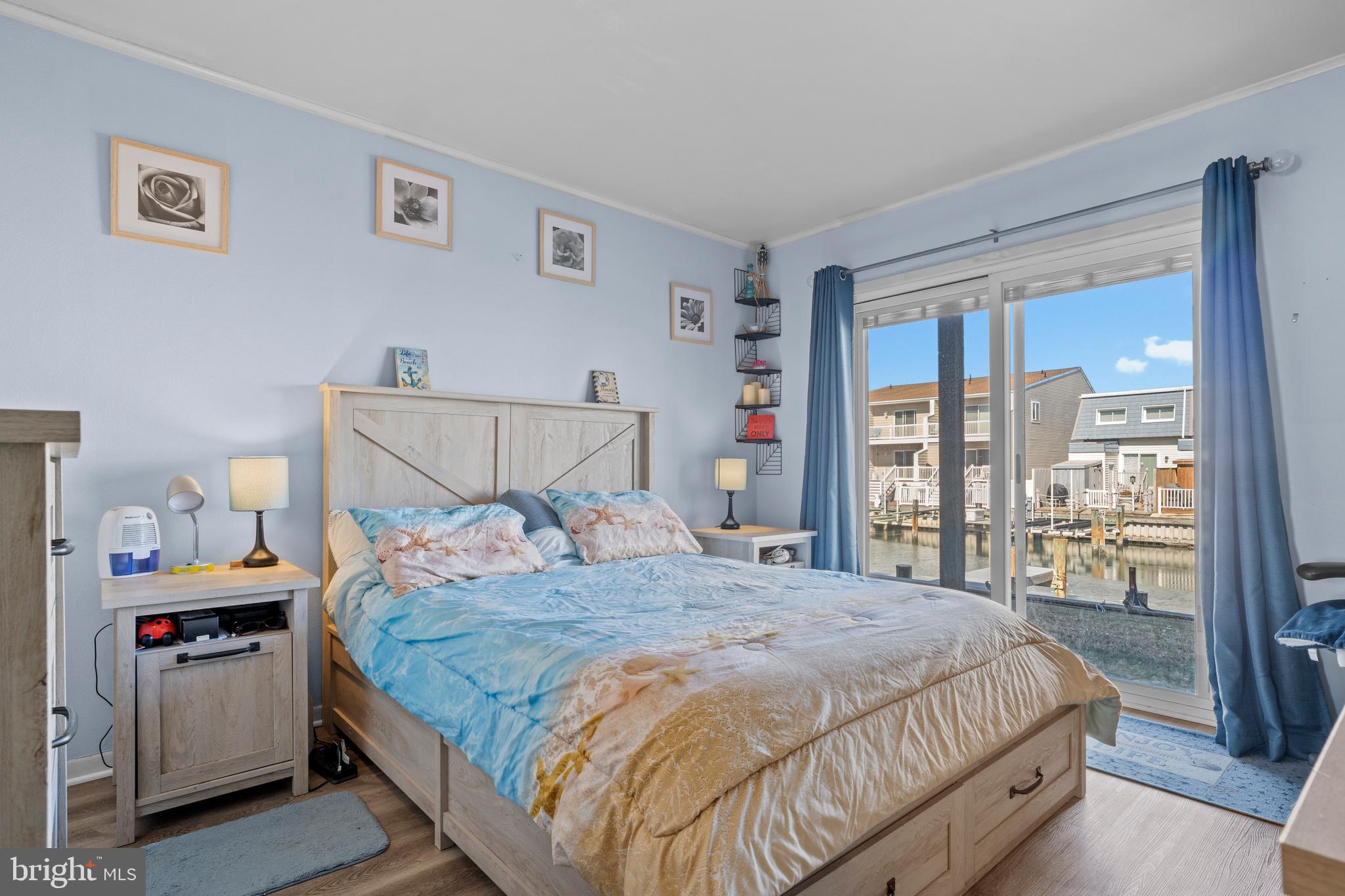 708 Bradley Road, Unit A1 Ocean City, MD 21842 - Photo 11 of 28 Primary Bedroom Overlooking Canal