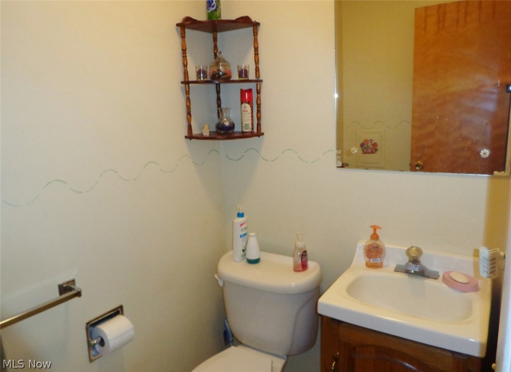 7703 Diagonal Road Kent, OH 44240 - Photo 9 of 19 A half bath is cleverly tucked away from the dinette.