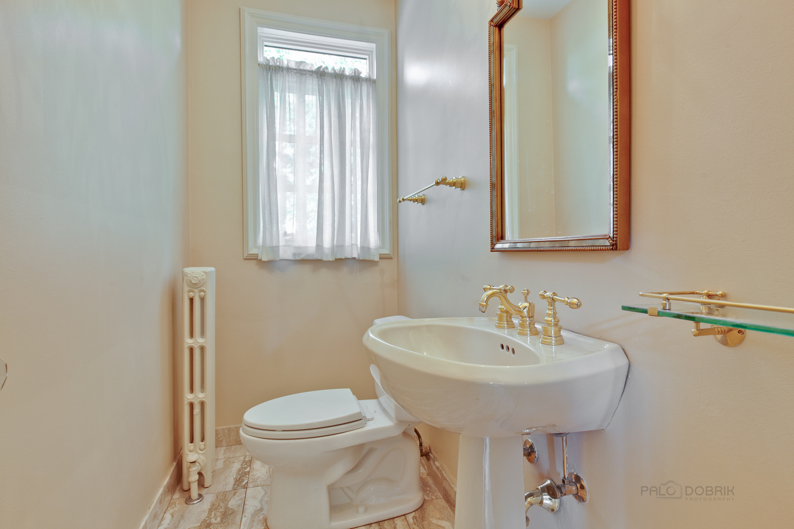 340 King Muir Road Lake Forest, IL 60045 - Photo 14 of 49 a bathroom with a sink toilet and mirror