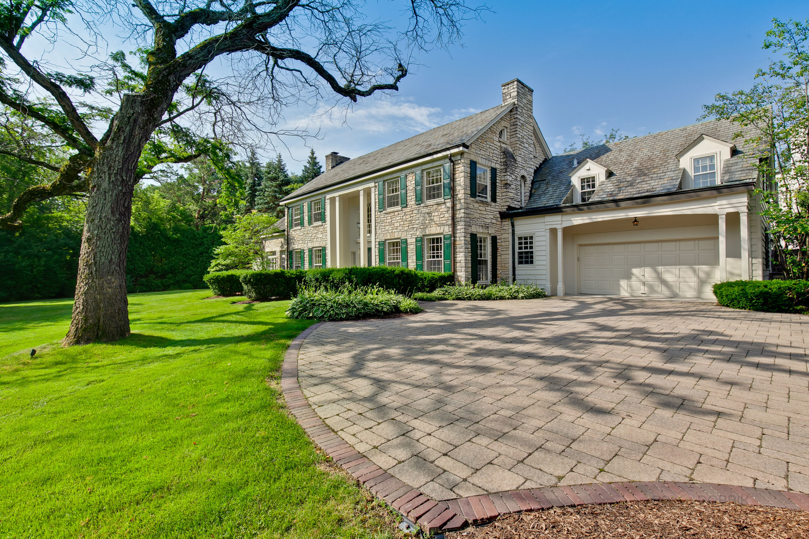340 King Muir Road Lake Forest, IL 60045 - Photo 3 of 49 a front view of a house with a yard