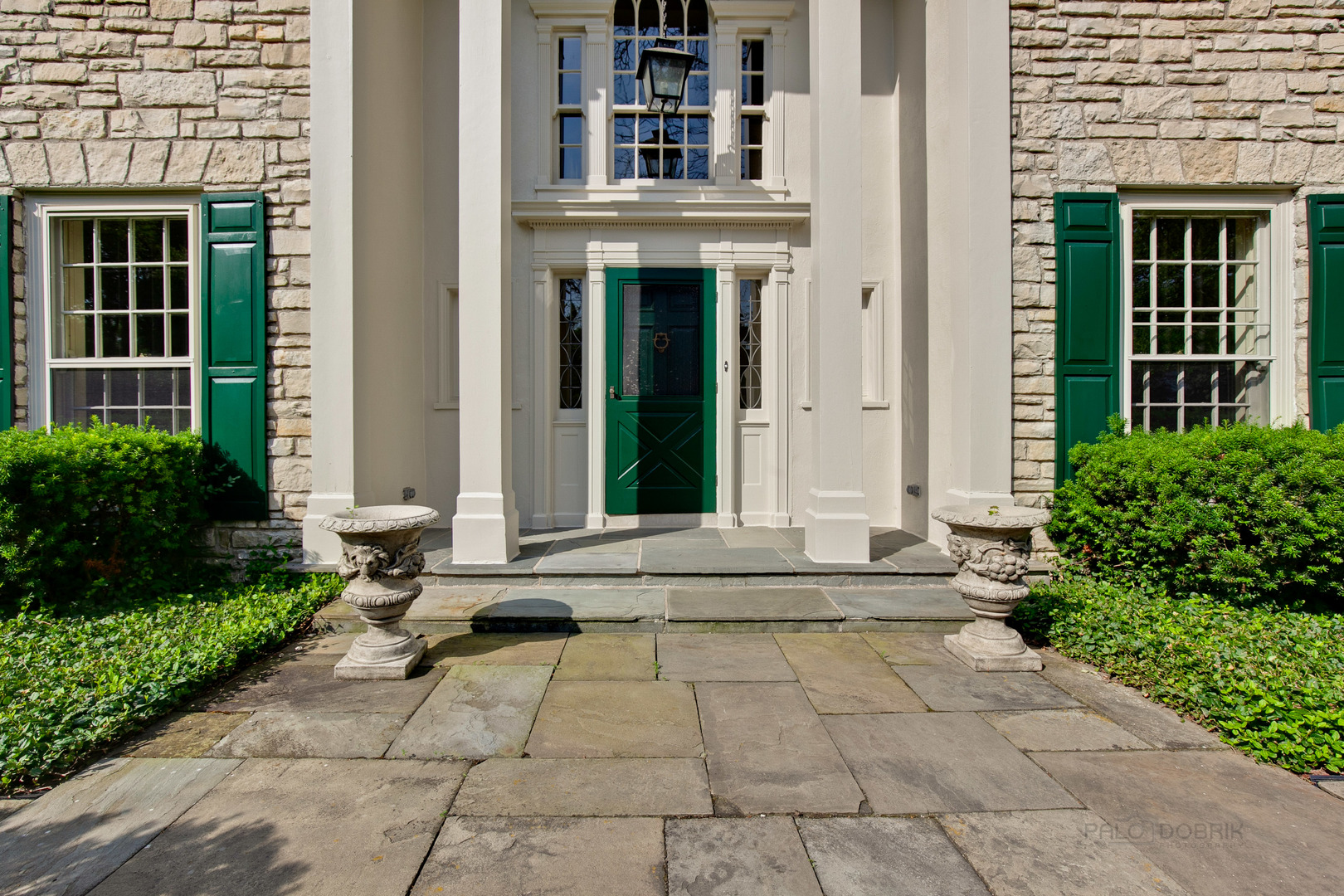 340 King Muir Road Lake Forest, IL 60045 - Photo 4 of 49 a view of a brick house with plants