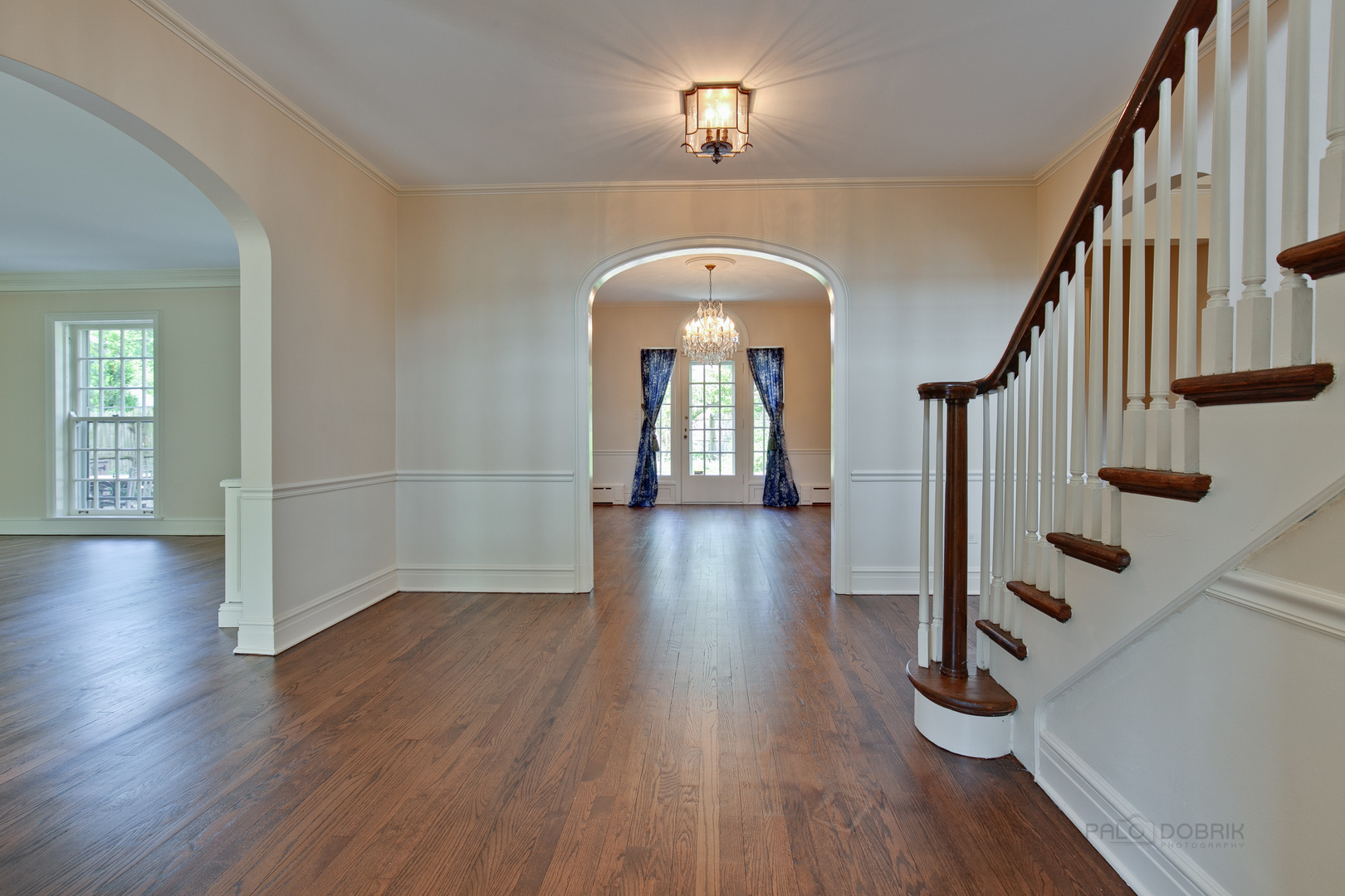 340 King Muir Road Lake Forest, IL 60045 - Photo 6 of 49 a view of a hallway with wooden floor and staircase