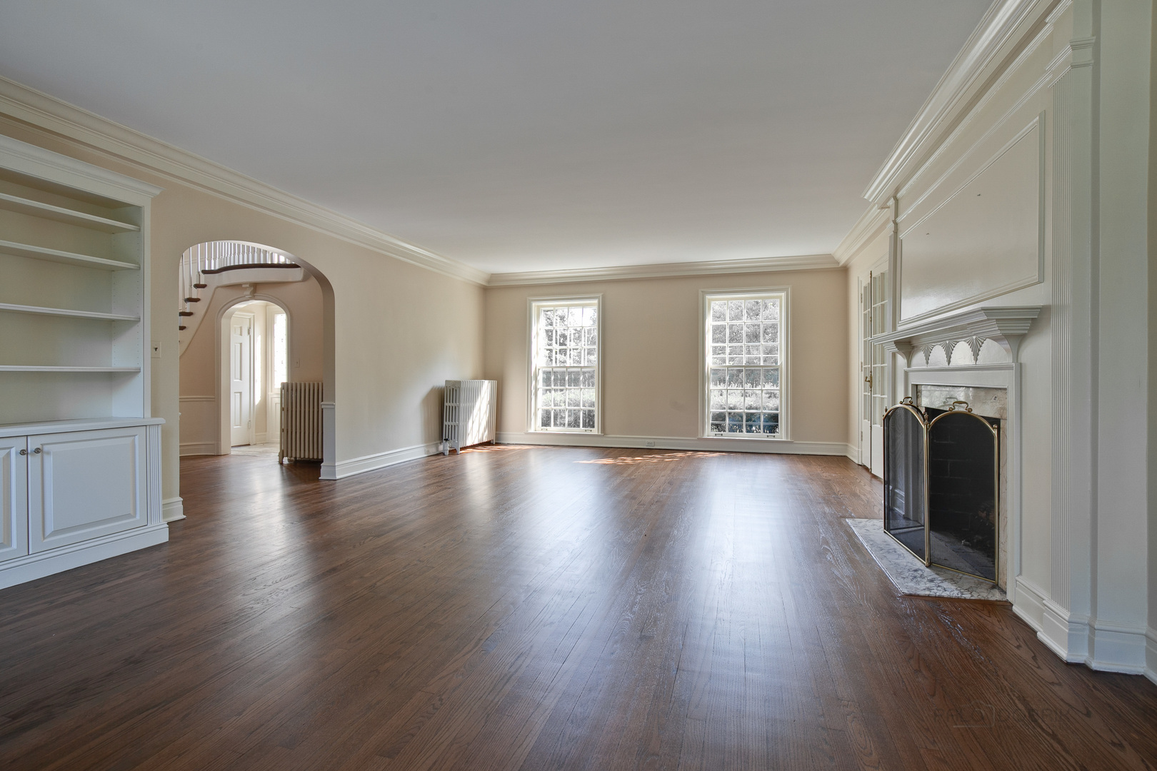 340 King Muir Road Lake Forest, IL 60045 - Photo 9 of 49 a view of empty room with wooden floor and fireplace