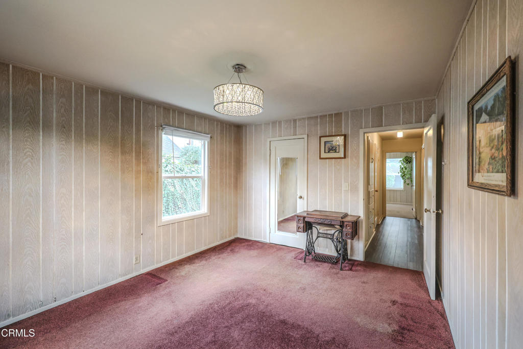 826 Cedar Street Fort Bragg, CA 95437 - Photo 20 of 42 an empty room with windows and ceiling fan