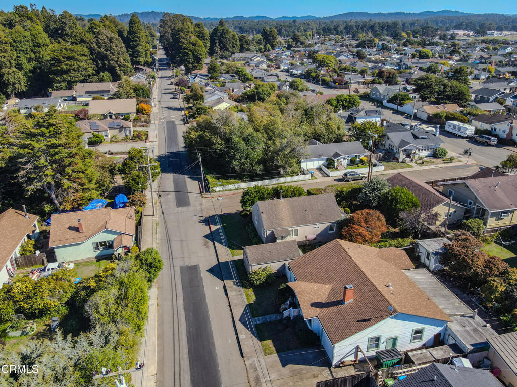 826 Cedar Street Fort Bragg, CA 95437 - Photo 22 of 42 an aerial view of a house with a yard