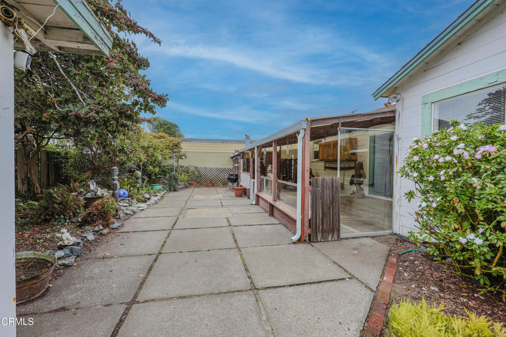 826 Cedar Street Fort Bragg, CA 95437 - Photo 32 of 42 a view of a porch with potted plants