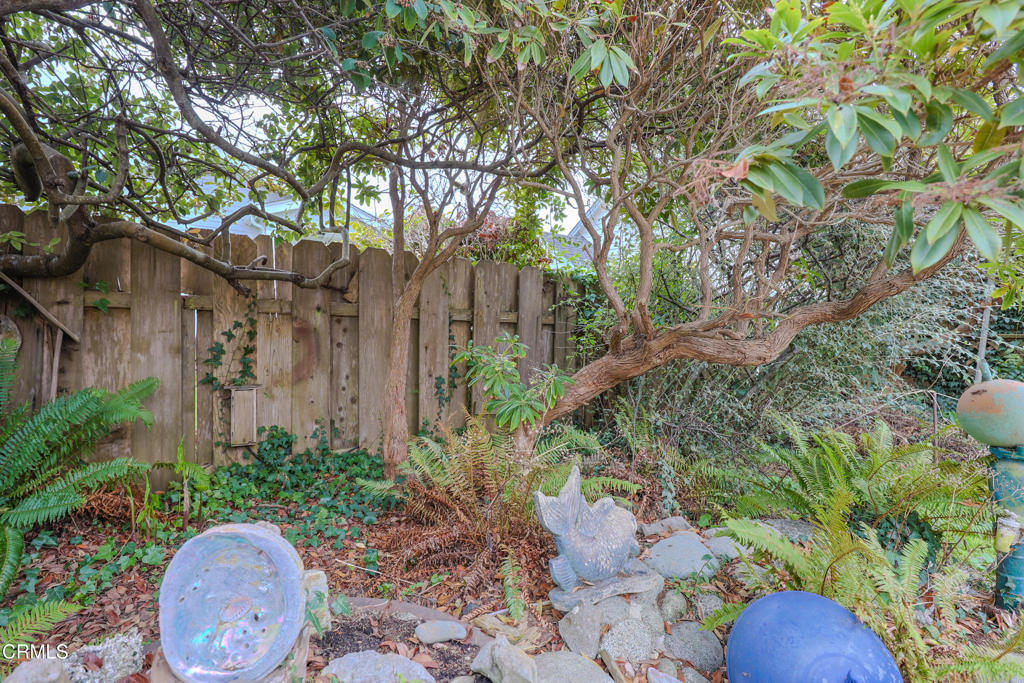 826 Cedar Street Fort Bragg, CA 95437 - Photo 35 of 42 a front view of a house with a yard